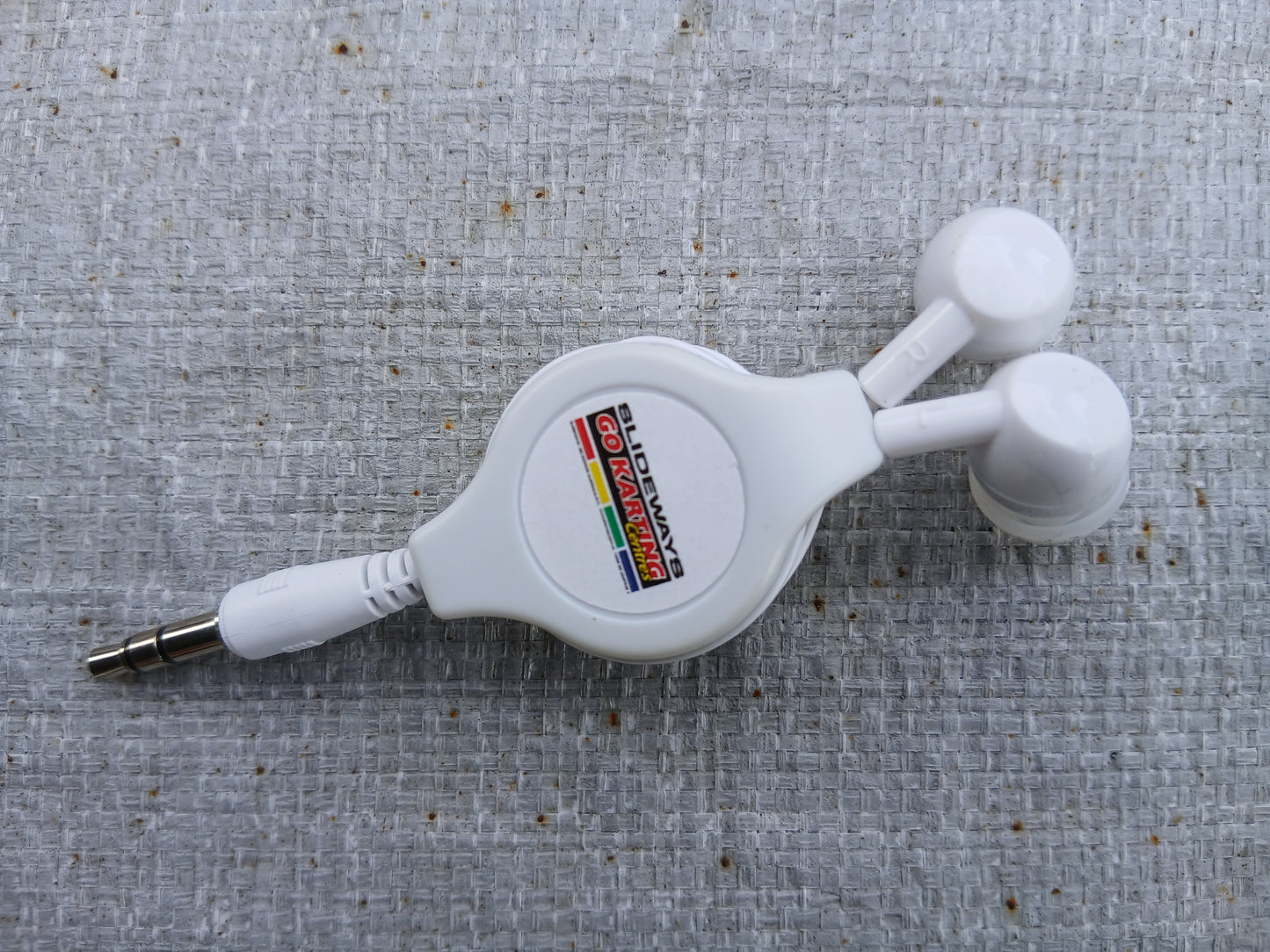 Portable 3.5mm Retractable Cable In-Ear Earphone